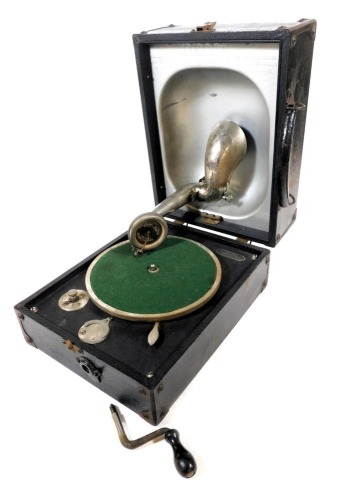 A Decca Junior Portable tabletop gramophone, for Farmers, the Music House, Nottingham, 24cm wide, 31cm deep.