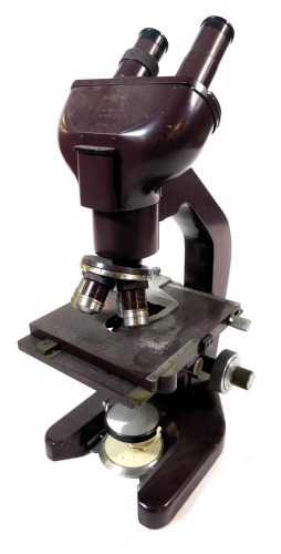 An early 20thC Watson binocular microscope, x15 magnification, serial number 127330.
