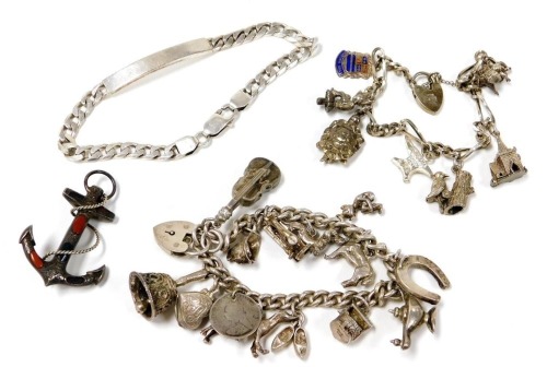 Two silver charm bracelets, with heart shaped padlock clasps, a curb link identity bracelet on a lobster claw clasp, and a Scottish silver and agate furled anchor brooch.