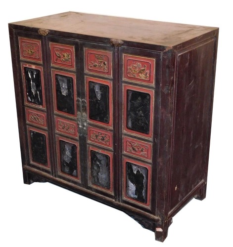 A Chinese polychrome lacquer cabinet, with two door front, parcel gilt, 95cm high, 95cm wide, 49cm deep.