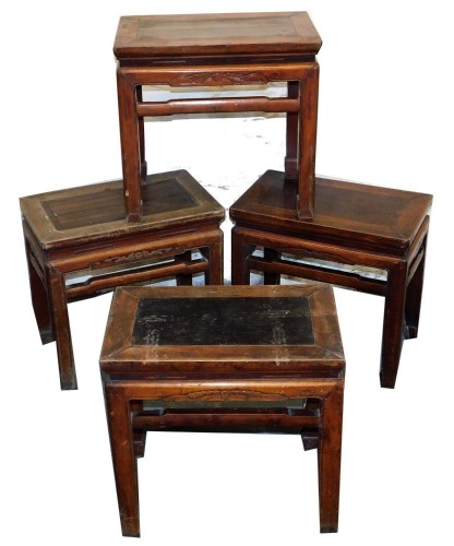 Four Chinese tables, with bat carved frieze, 50cm high, 54cm wide, 35cm deep.