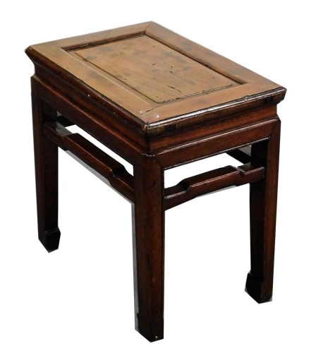 A Chinese elm topped hardwood table, 50cm high, 50cm wide, 35cm deep.