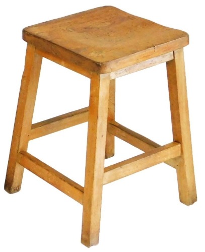 A mid Century elm and beech stool.