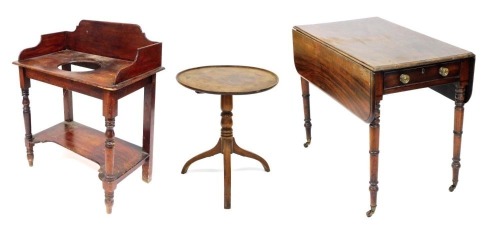 A George III mahogany occasional table, the circular top raised on a turned column over three splayed legs, 55cm high, 50cm wide, a Victorian stained pine wash stand, with a galleried back, central recess for a bowl, raised on turned legs united by a shap