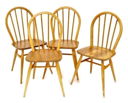 A set of four Ercol ash and elm kitchen chairs.