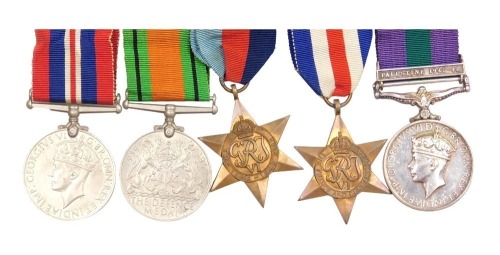 A WWII medal group, comprising 1939-45 British War medal, Defence medal, 1939-45 Star, France and Germany Star and George VI General Service medal, with Palestine 1945-48 clasp, the latter medal engraved 408692 Sgt. C Rhodes, RAOC.