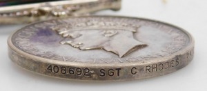 A WWII medal group, comprising 1939-45 British War medal, Defence medal, 1939-45 Star, France and Germany Star and George VI General Service medal, with Palestine 1945-48 clasp, the latter medal engraved 408692 Sgt. C Rhodes, RAOC. - 3