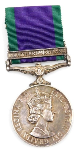 A Queen Elizabeth II General Service medal, with Northern Ireland clasp, inscribed to 24188673 Gnr. P Bradley, RCT.
