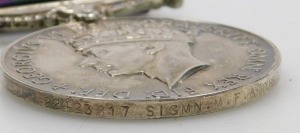 A George VI medal group, comprising 1939-45 British War medal, Defence medal, Africa Star with 8th Army insignia, 1939-45 Star (lacking ribbon), General Service medal with Malaya clasp, inscribed to 22423817 Signalman MF Archer Royal Signals, and Army Lon - 4