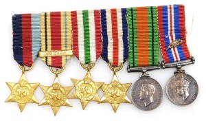 A WWII miniature medal group, comprising 1939-45 British War medal with oak leaf insignia (mentioned in dispatches), 1939-45 Star, Africa Star (with 8th Army clasp), Italy Star, France and Germany Star and Defence medal.