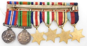 A WWII miniature medal group, comprising 1939-45 British War medal with oak leaf insignia (mentioned in dispatches), 1939-45 Star, Africa Star (with 8th Army clasp), Italy Star, France and Germany Star and Defence medal. - 2