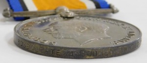 A WWI bronze death plaque and medal pair, the death plaque named to Harold Godber, and the medals inscribed to 306984 Pte H Godber, West Riding Regiment, Killed in Action 3/5/1917, and buried at Arras, with postage envelopes and medal box, with original c - 5