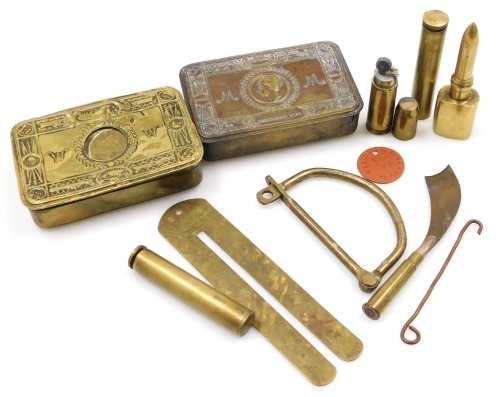 Two WWI Princess Mary brass gift tins, Christmas 1914 (both AF), a Player Bros brass button stick, ID (dog tag) for Second Lieutenant HS Gibson, Yorkshire and Lancashire Regiment, brass shell case lighter, kit bag lock, oil cans, etc.