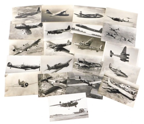 A collection of black and white photographic postcards of WWII aircraft.
