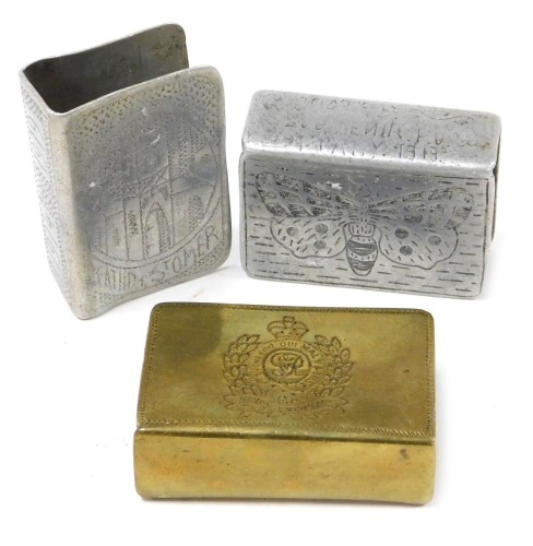 Three WWI trench craft matchbox holders, including a brass holder with Royal Engineers Regimental crest and with name and address P Onyon, 16 Handley Street, Sleaford, Lincs, and two aluminium matchbox holders, one engraved Arras 1914-1919, the other engr