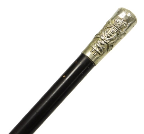 A WWI heavy dark Malacca cane swagger stick, with embossed white metal regimental knop and crest for The Queen's Own Cameron Highlanders, 72cm.