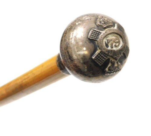 A WWI Malacca cane swagger stick, with silver embossed pommel knop for the Queen's Own Cameron Highlanders, stamped Swaine and Adeney Limited London, hallmark date letter indistinct, 77cm long.