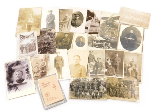A collection of WWI photographs of soldiers, mainly individual portraits and some group photographs, mainly on postcards, including Lincolnshire Regiment and Royal Flying Corps. (20)