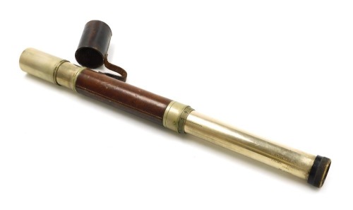 A WWII British Royal Naval telescope, by W Ottway & Co Limited London, with single draw action, marked Patt 373 number 4362 1942 and with broad arrow marking, plain leather grip and leather cover.