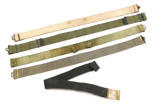 Five various military webbing belts, including one with King's Regiment crested brass buckle.