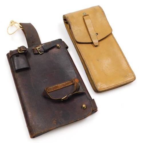 A WWI German leather map case, and another, the German cased stamped OGME, and the later case indistinct marks circa 1962.