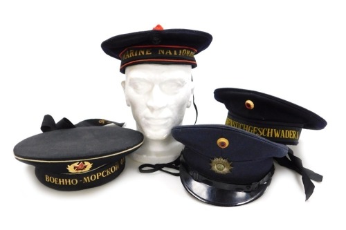 German, Russian and French military headdress, in the form of a German dress cap by Albert Kempfk, 1963, and a German Naval cap by Gebr&uacute;der Klotz, circa 1959, a post war Russian naval hat, and a French Marine Nationale Naval cap. (4)