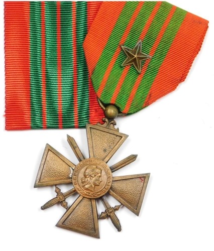 A French WWII Croix de Guerre 1939, with star to the ribbon, and additional ribbon.
