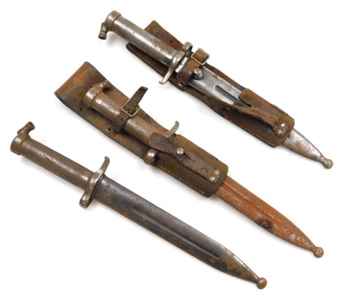 Three Swedish 1896 pattern Mauser bayonets, all with steel scabbards and two with leather frogs.