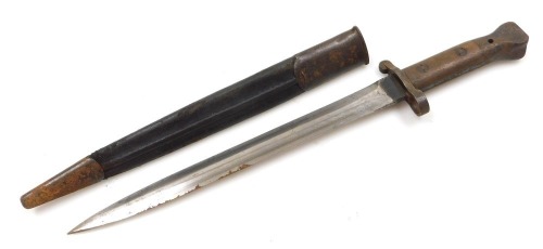 A British Army 1903 pattern SMLE bayonet by Wilkinson, the 29cm double edge blade stamped Wilkinson London to the ricasso and ER with a crown, with leather sheath stamped Wilkinson also 35W.
