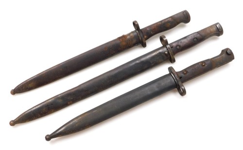 Three various Mauser rifle bayonets, one with 29.5cm blade stamped number 9708 to the pommel, with steel scabbard, another with 25cm blade with unidentified stamp mark to the ricasso, with steel scabbard, and another 22.5cm double edged blade, with indist