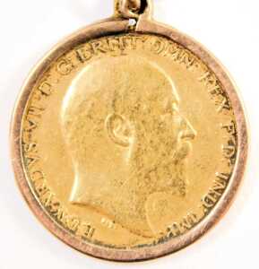A 9ct gold cased pocket watch, with white enamel numeric dial, blue hand and seconds dial, on a 9ct gold chain with T bar and clip, the chain mounted with 9ct gold wedding band and 22ct gold wedding band, clock key, and an Edward VII half gold sovereign d - 9