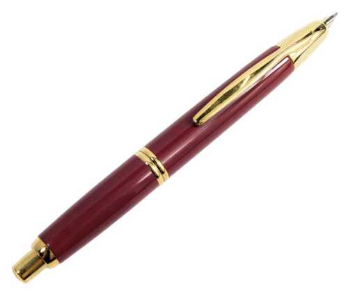 A Pilot retractable fountain pen, in burgundy casing, with 18ct nib.