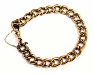 A Victorian hammered link gold plated watch chain bracelet, with single clip and safety chain, 22cm long. - 2
