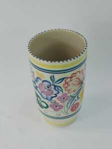 A 20thC Poole pottery vase, of cylindrical form, traditionally painted with flowers, printed mark, 24cm high. - 2