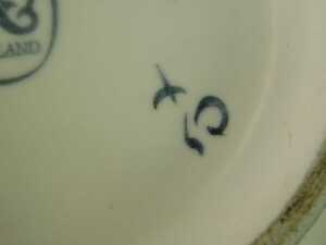 A 20thC Poole pottery vase, of cylindrical form, traditionally painted with flowers, printed mark, 24cm high. - 4