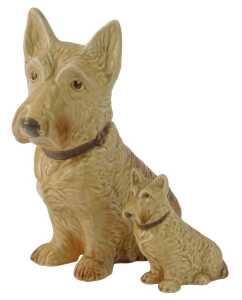 Two Sylvac seated terriers, each on a brown mottled ground, 27cm and 12cm high. (2)