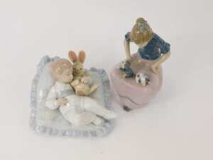 A Lladro porcelain figure, modelled as a child seated on cushion with rabbit, 14cm high, together with a Nao porcelain figure of a girl with puppies, 17cm high. (2) - 2