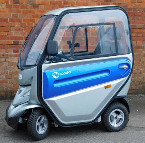 A Kondor Abilize mobility scooter, product number MS03077, serial number 19JSA0012, in a silver and blue finish with instruction booklet, keys and mobility scooter alarm.