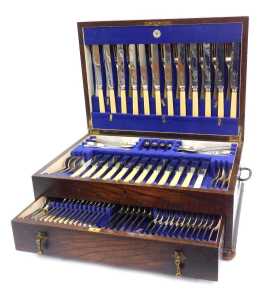 A Viners of Sheffield cased ivorine handled cutlery set, twelve place settings, in fitted oak case, with beaded border, on bun feet, 22cm high, 50cm wide, 35cm deep.