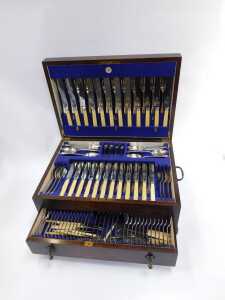 A Viners of Sheffield cased ivorine handled cutlery set, twelve place settings, in fitted oak case, with beaded border, on bun feet, 22cm high, 50cm wide, 35cm deep. - 2