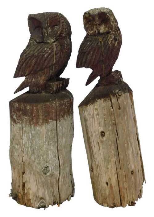 Two carved driftwood owls on plinths, overpainted in brown, 80cm high. (AF) (2)