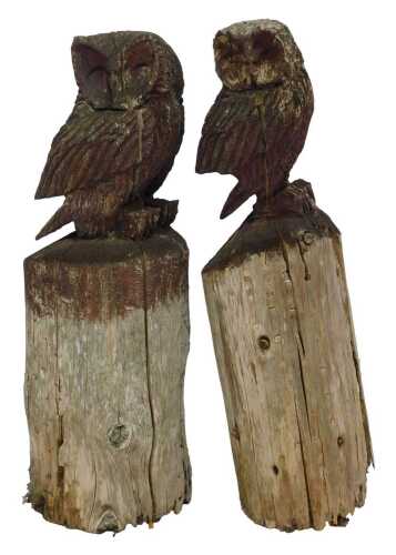 Two carved driftwood owls on plinths, overpainted in brown, 80cm high. (AF) (2)