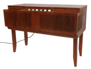 A HMV teak cased record player, with a Garrard 3000 player, 66cm high, 92cm wide, 50cm deep.