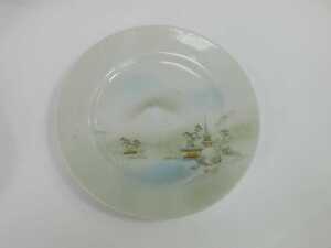 A 20thC Japanese eggshell porcelain tea set, comprising teapot, milk jug, sugar bowl, eight cups and saucers, four medium plates and a bowl, each decorated with buildings, mountains and trees, on a white ground. - 3