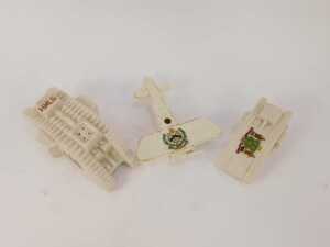 Three items of crested china, comprising a Carlton china tank with Sheffield crest, an Ashby Crest Waterfall china tank, and a Waterfall Heraldic china biplane for the County Borough of Grimsby. (3, AF) - 2