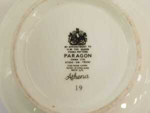 A Paragon porcelain part tea and dinner service decorated in the Athena pattern, comprising seven breakfast bowls, gravy boat and saucer, lidded two handled sugar bowl (AF), four teacups, six saucers, two lidded tureens, five cake plates, six side plates, - 2