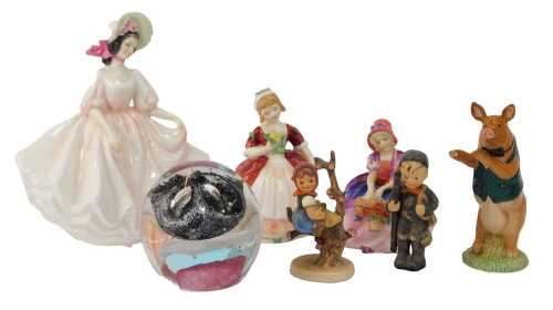 A group of collector's ceramics, comprising a Royal Doulton figure, modelled as Sunday Best HN2698, Monica HN1467, Valerie HN2107, together with two Goebel Hummel figures, a Beswick pottery figure modelled as David PP3, and a glass paperweight. (7)