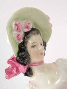 A group of collector's ceramics, comprising a Royal Doulton figure, modelled as Sunday Best HN2698, Monica HN1467, Valerie HN2107, together with two Goebel Hummel figures, a Beswick pottery figure modelled as David PP3, and a glass paperweight. (7) - 4