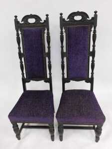 A pair of Victorian ebonised hall chairs, each with a high carved raised back, with later purple upholstered seats and backs, 140cm high, 55cm wide. - 2