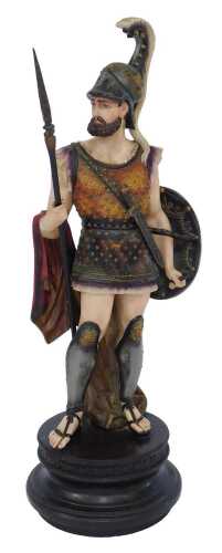 A plaster sculpture modelled as a Roman Centurion, with dagger, on a circular socle, 70cm high. (AF)